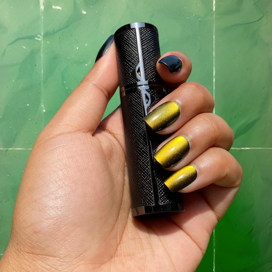 SPRITZ Brando Limited Edition refillable perfume atomizer in hand in all-black