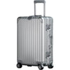 SPRITZ™ Bourdain Suitcase in silver with extended telescopic handle, TSA-approved lock, and spinner wheels