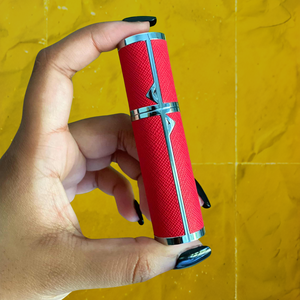 SPRITZ Hepburn refillable perfume atomizer — in hand, red 