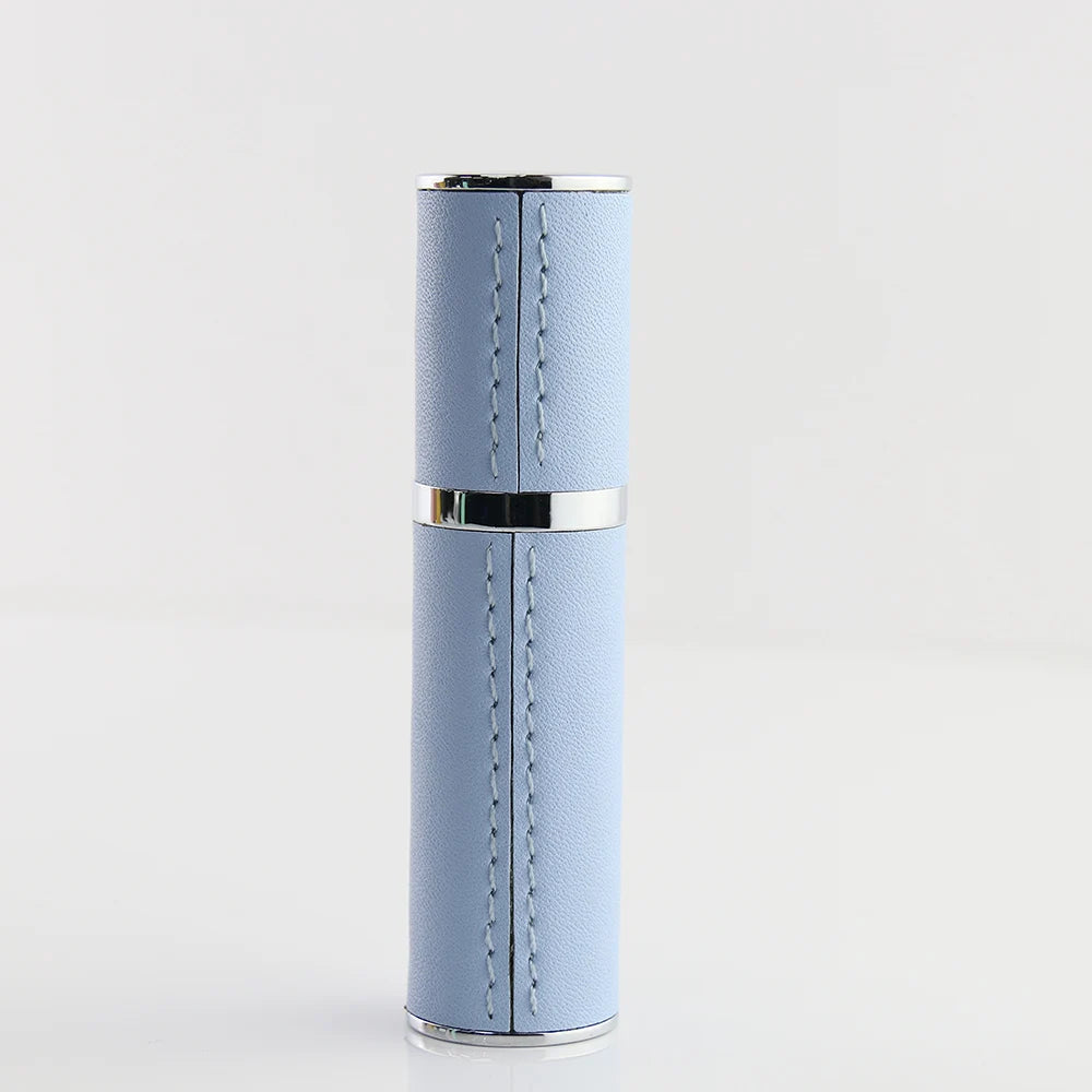 SPRITZ Warhol 10ml refillable perfume atomizer in Light Blue — travel size